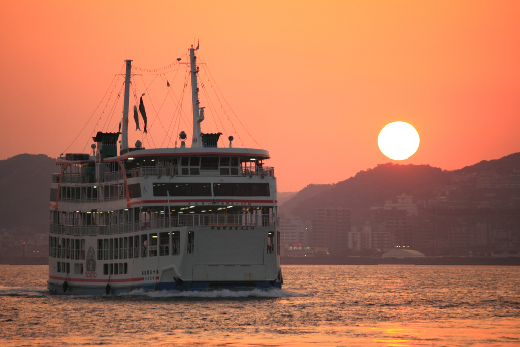 Sunset and Sakurajima Ferry